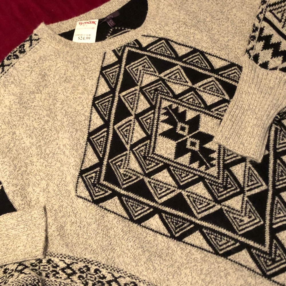 Pull over poncho. New with tags. Size L/XL